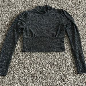 Woman’s size large shiny top